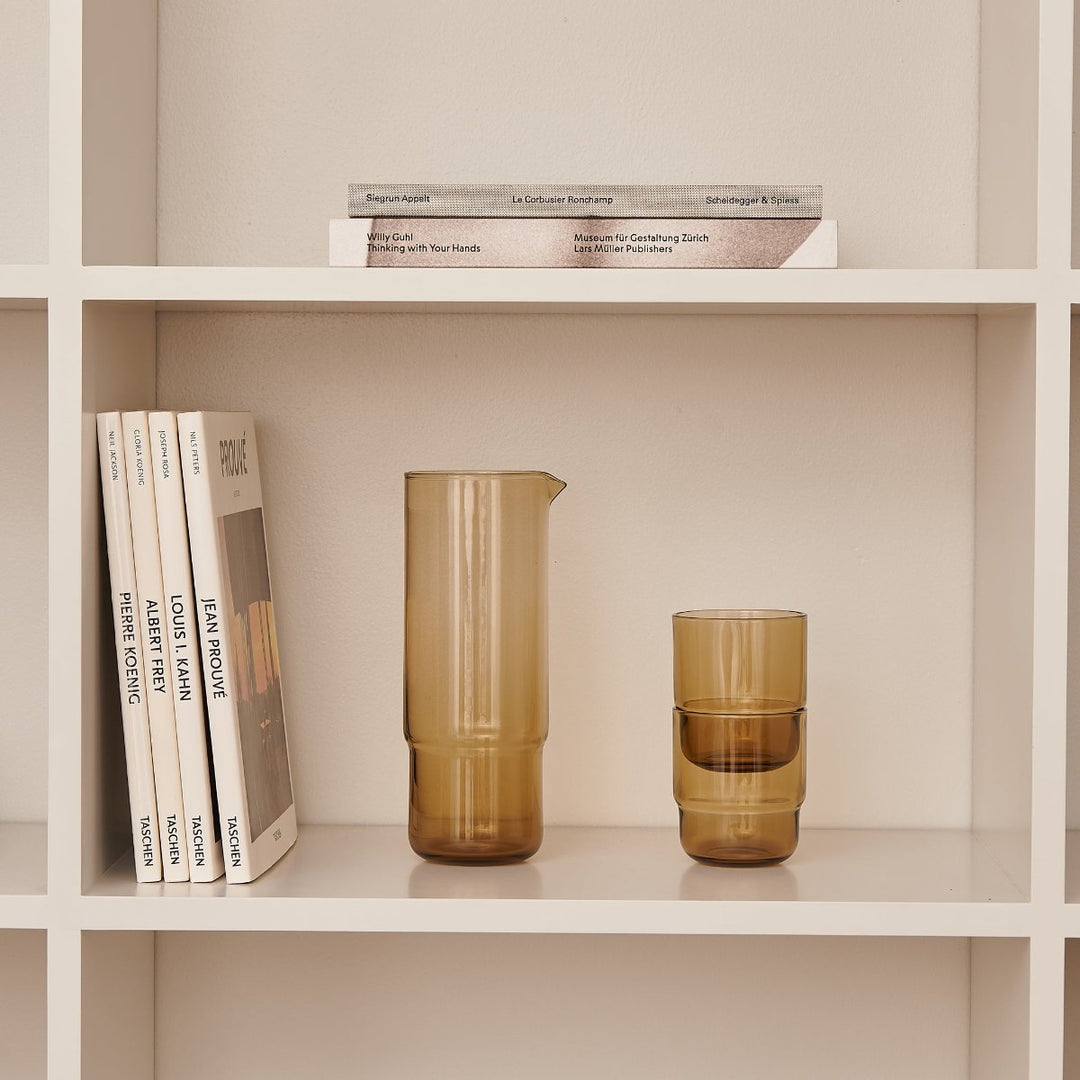 Handmade brown carafe and brown drinking glasses