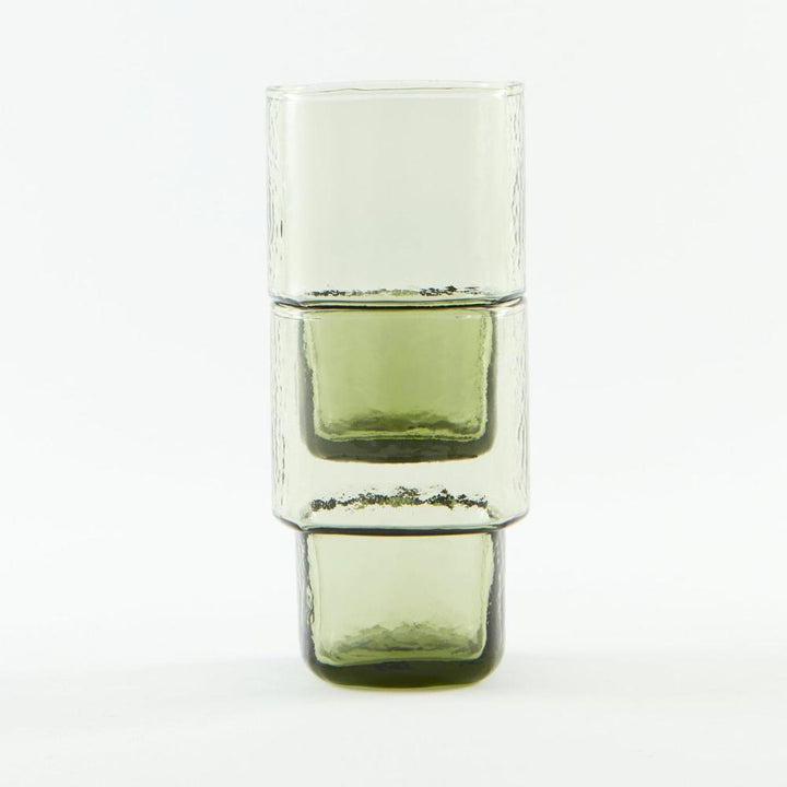 A set of 2 stackable, tall olive-green handmade drinking glass with hammered texture