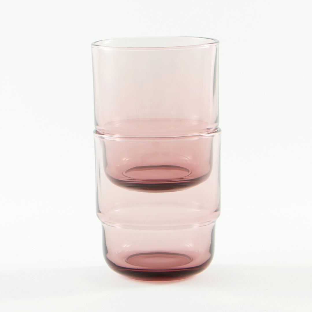 Sturdy stackable minimalistic drinking glasses in pastel pink