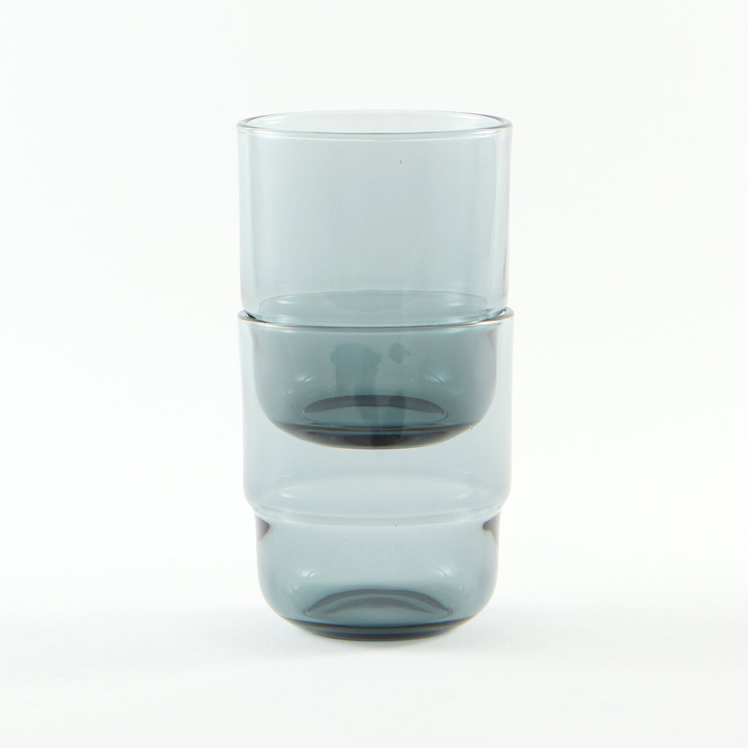 Sturdy, stackable, minimalistic water glass in pastel blue grey