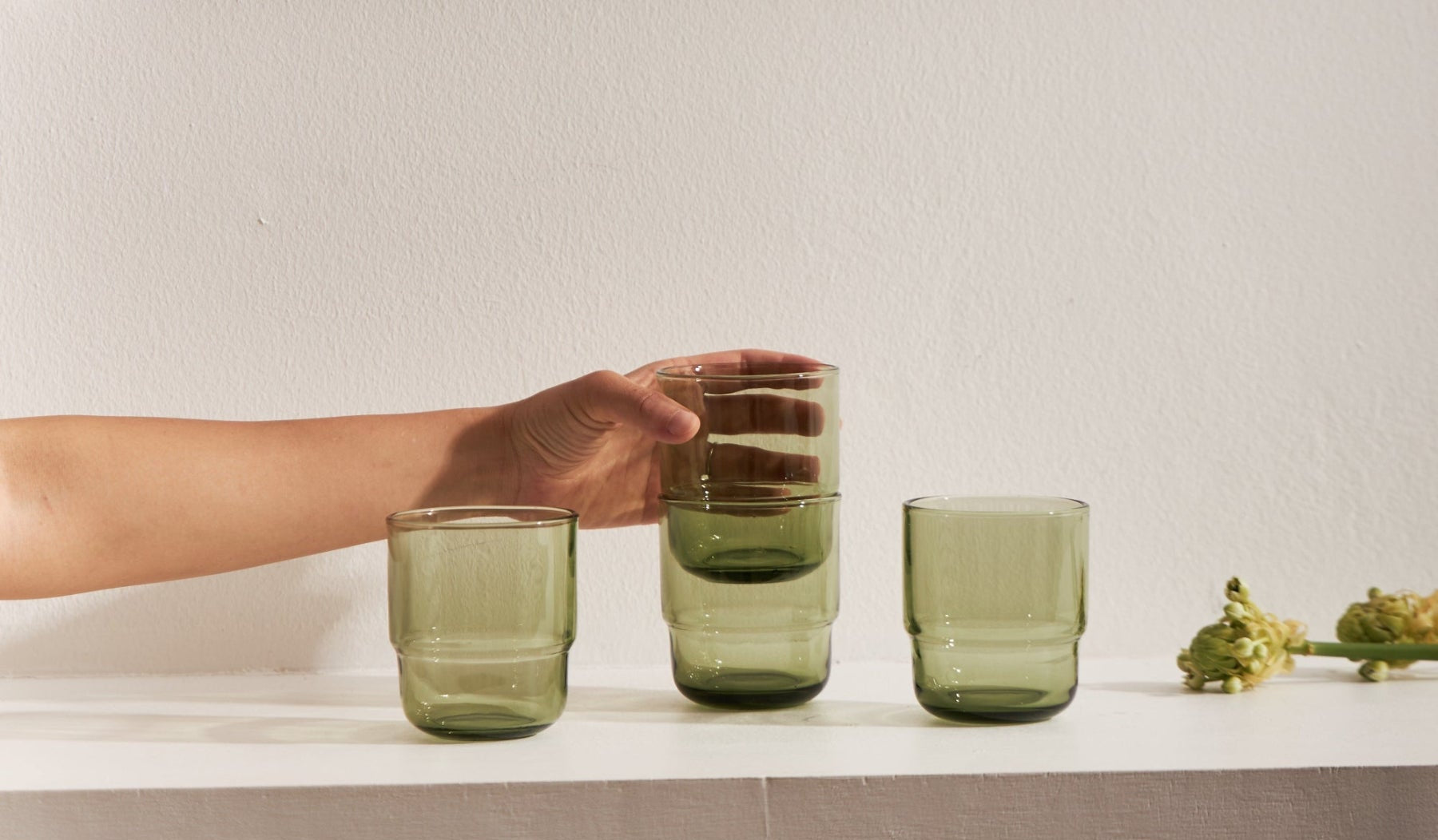 Stackable drinking glasses in olive green