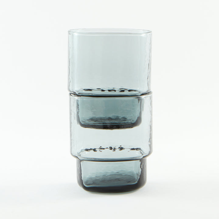 Modern, wide and big, stackable coloured handmade drinking glasses in blue grey