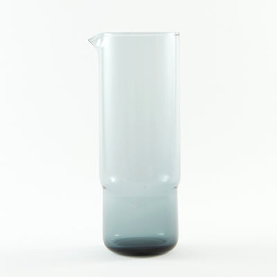 A 1 litre handmade straight cylinder glass carafe in blue grey