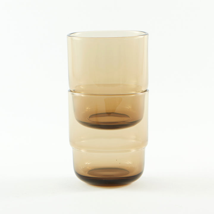 Sturdy, stackable, minimalistic small coloured drinking glasses in brown 