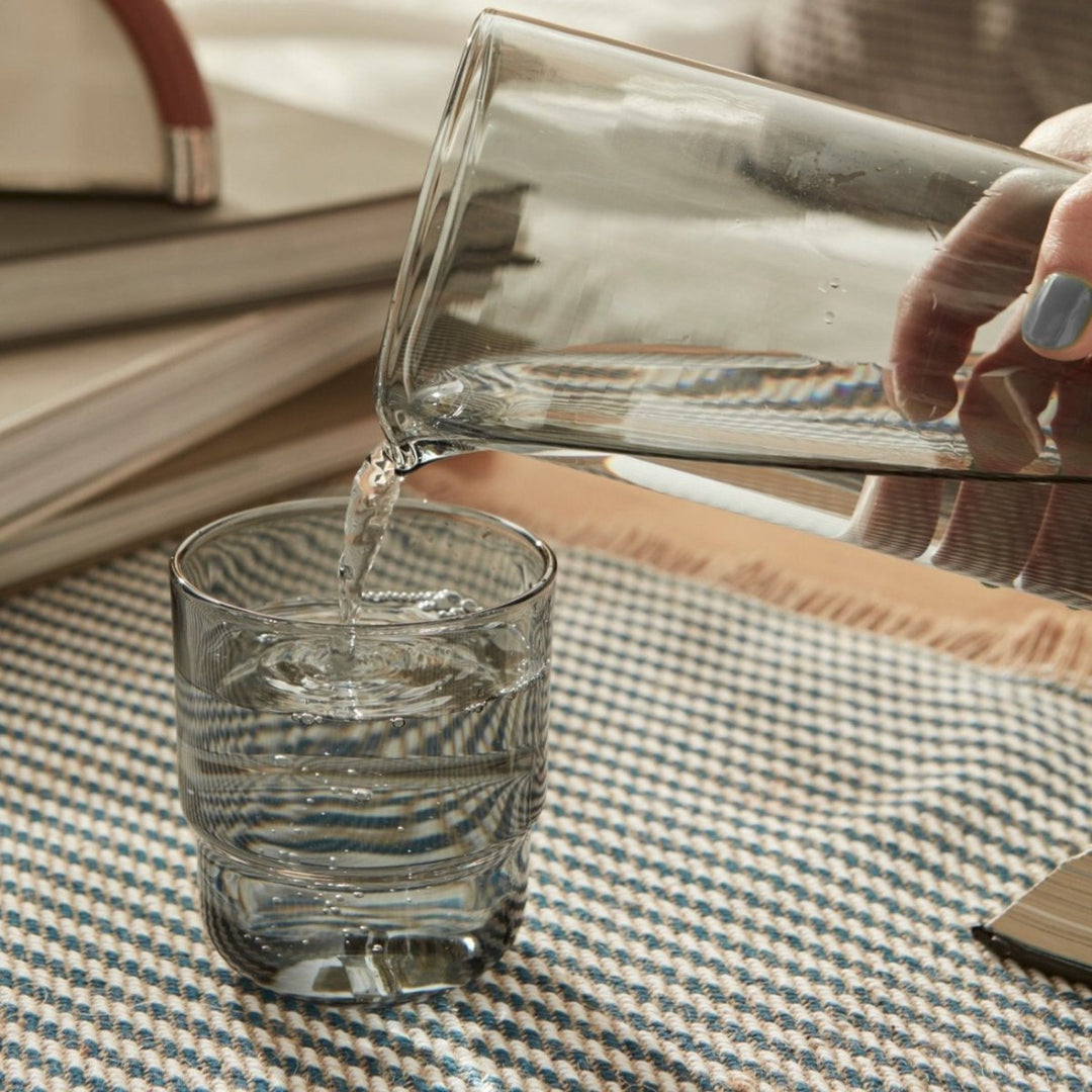 handmade straight drinking glass with smaller bottom in smoke grey