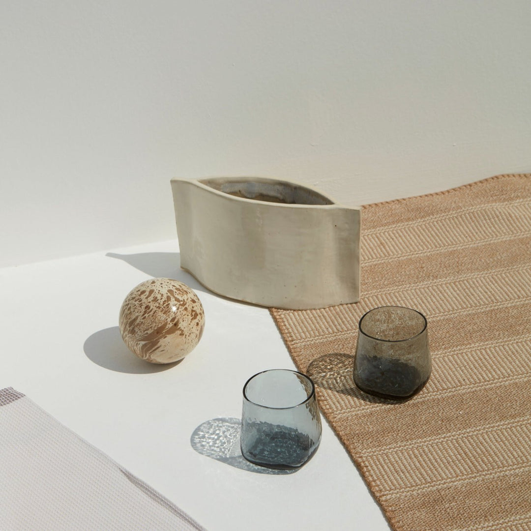 Smoke grey minimalistic drinking glasses with a unique shape 