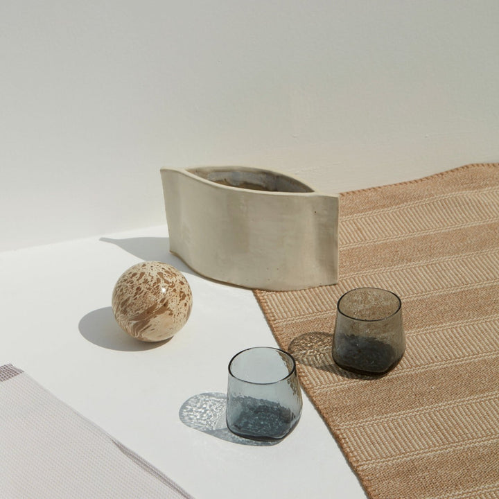 Smoke grey minimalistic drinking glasses with a unique shape 